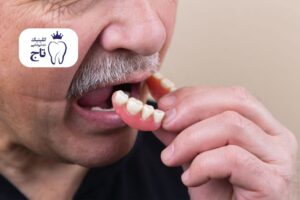 برای جا افتادن دندان مصنوعی چه کنیم